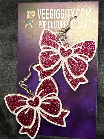 Pink glitter bow acrylic earrings